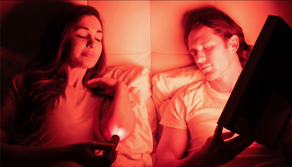 Woman using Baton Rouge while a man using energy square in bed