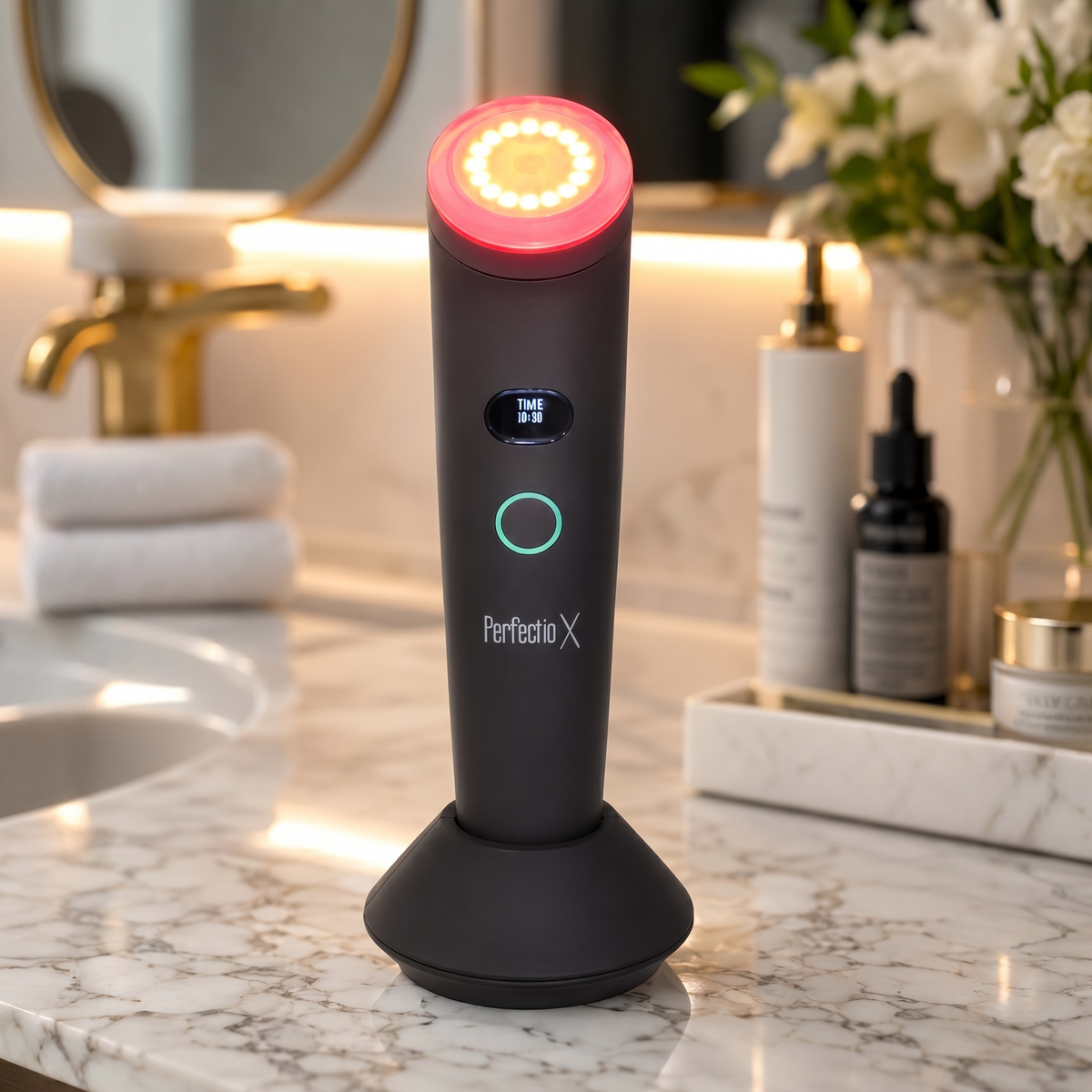 Perfectio X light therapy wand charging on a marble bathroom vanity