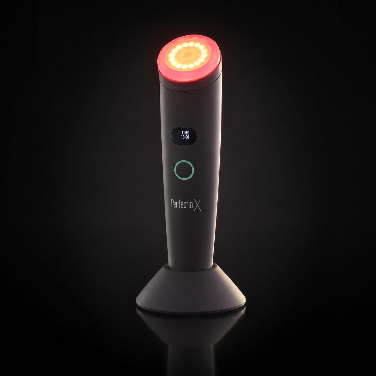 Perfectio X light therapy wand glowing red on a dramatic black background
